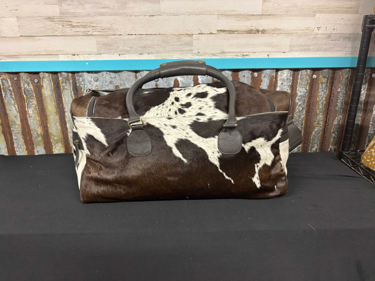 Cowhide Backpacks & Duffels