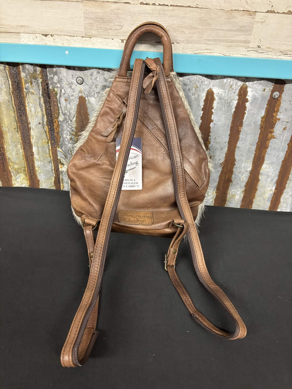 Convertible Cowhide Sling Backpack by American Darling