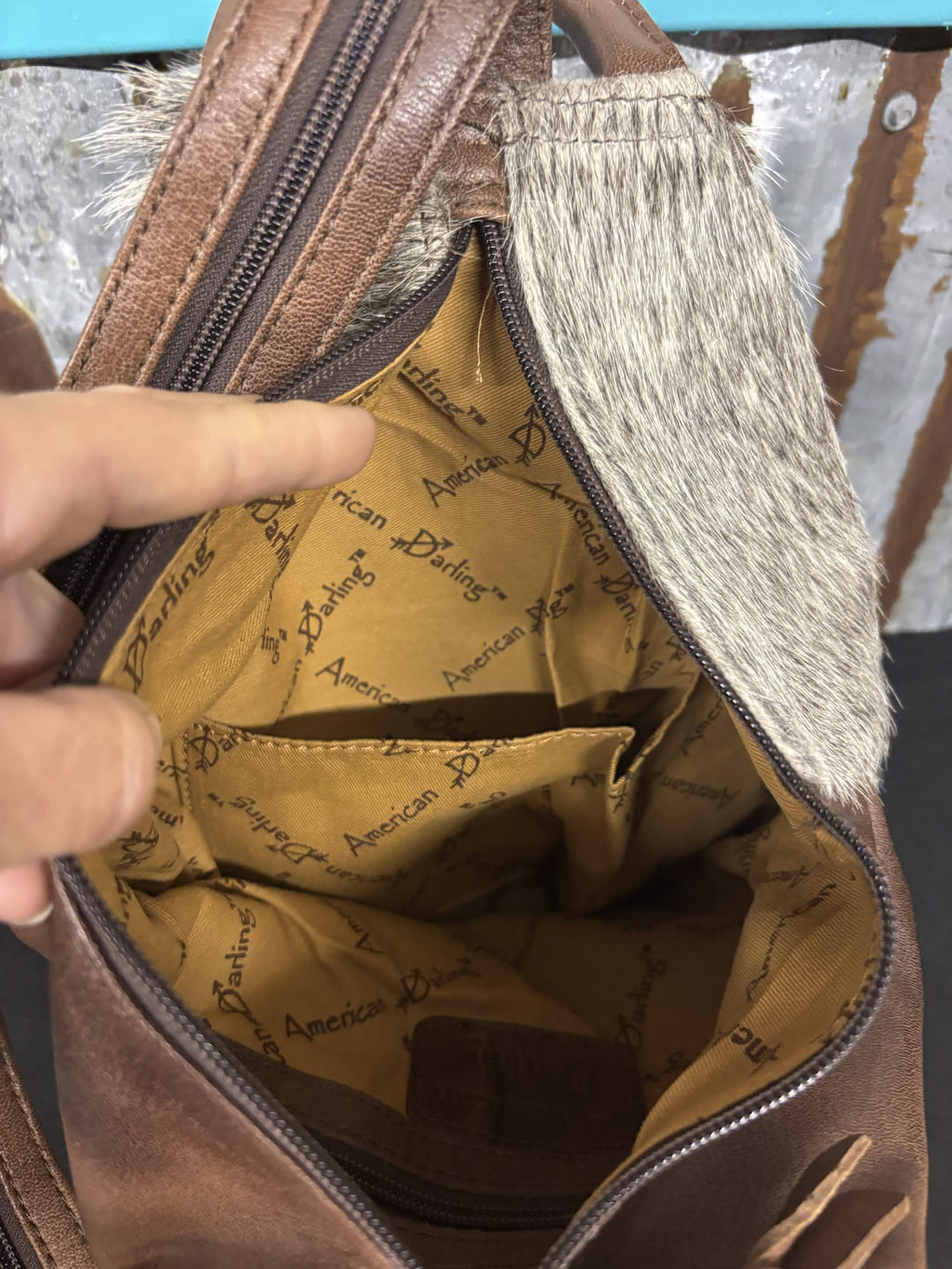 Convertible Cowhide Sling Backpack by American Darling