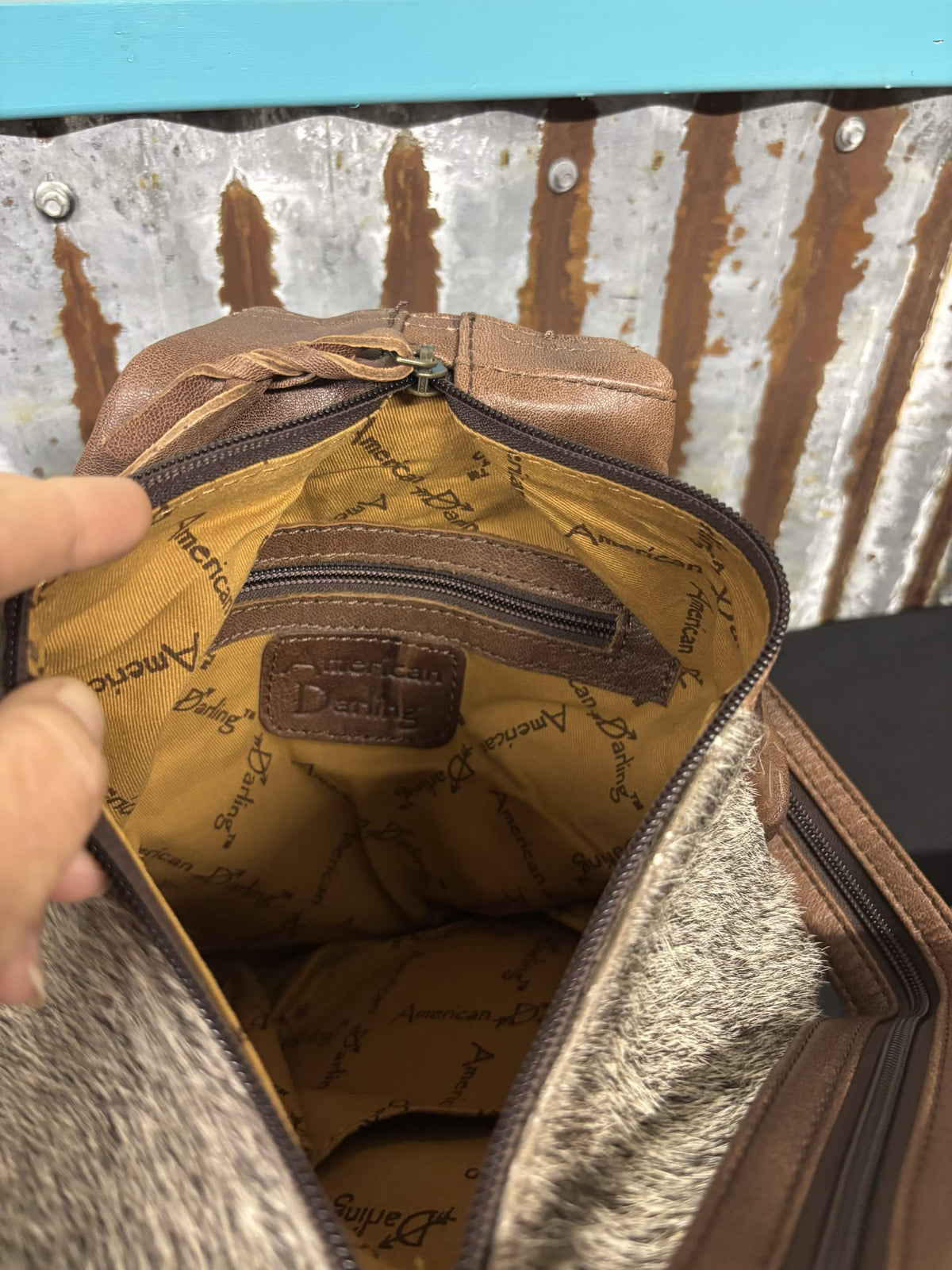 Convertible Cowhide Sling Backpack by American Darling