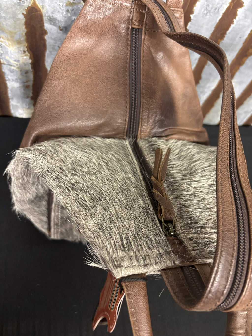 Convertible Cowhide Sling Backpack by American Darling