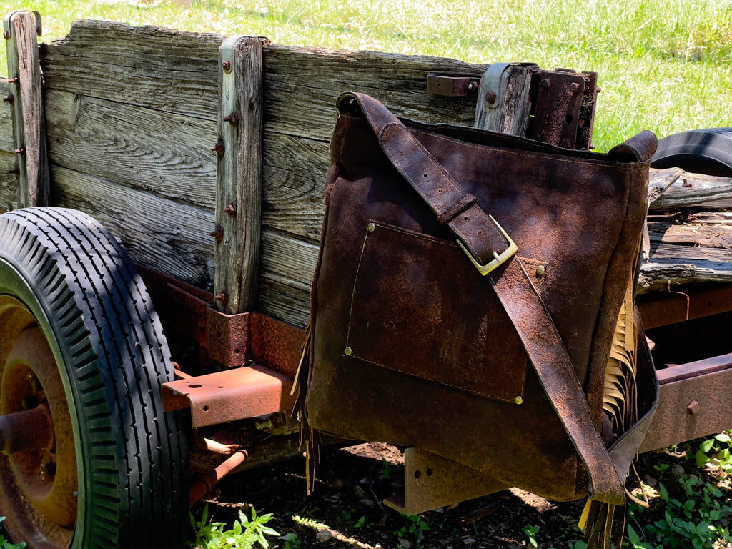 Large Axis Purse With Leather